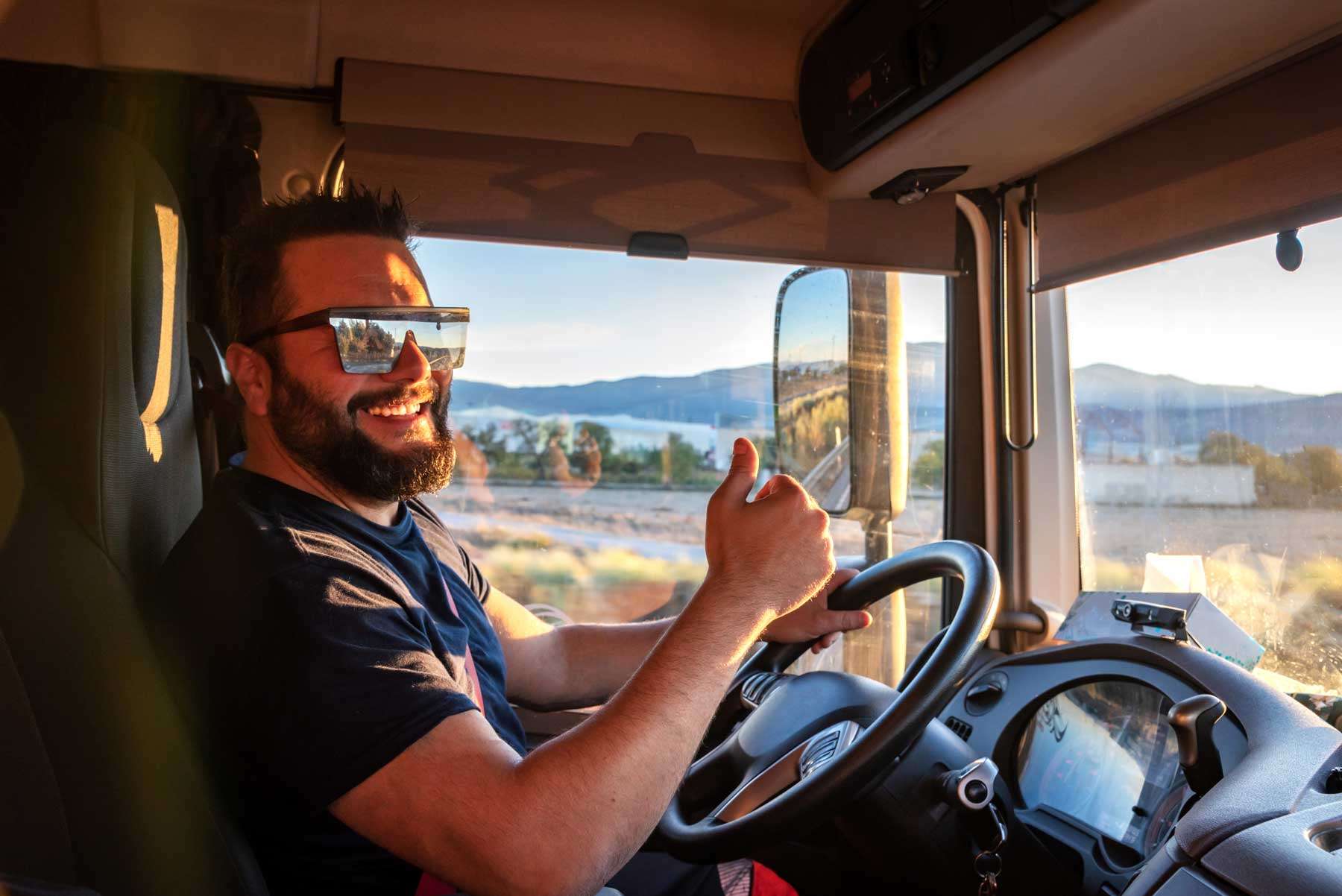 Car Shipping Carrier Driver behind the wheel