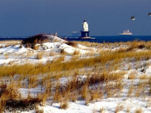Delaware shore winter scene of lighthouse